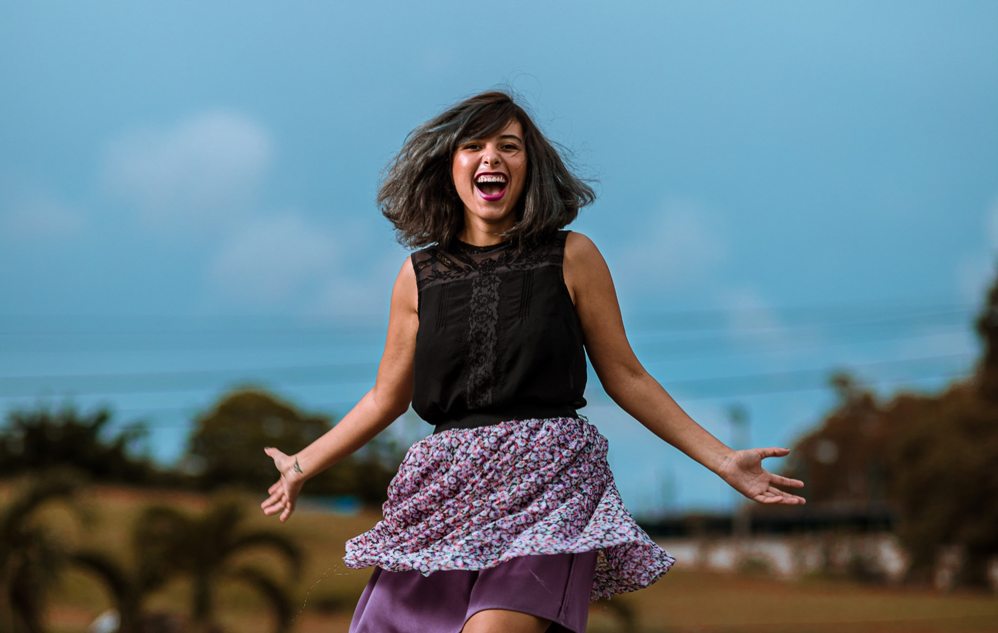 woman smiling fit after having a baby