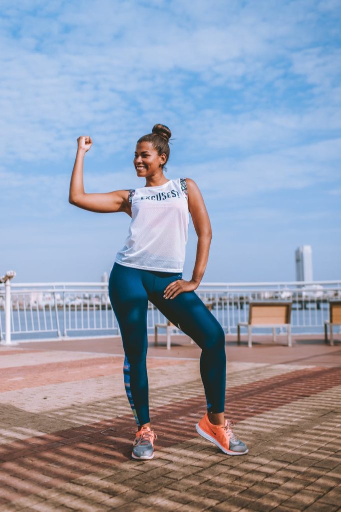 woman fit showing arm muscles