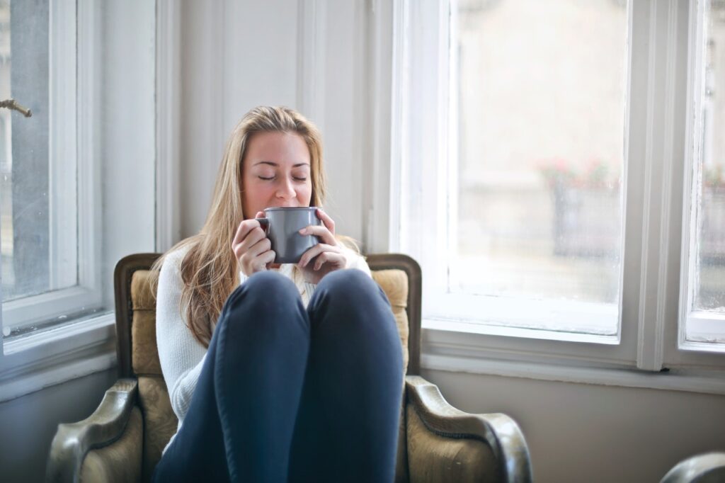 Woman sipping coffee