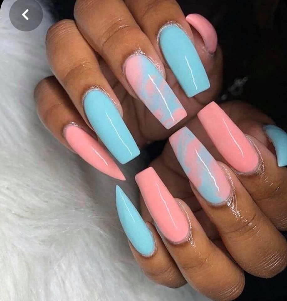 hands showing off nail polish pink and blue long