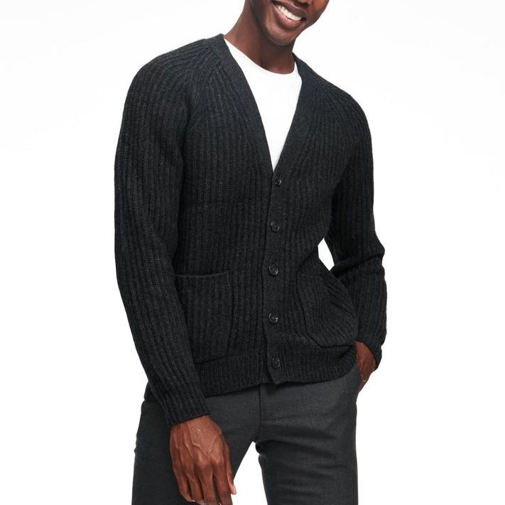 Man wearing black wollen cardigan
