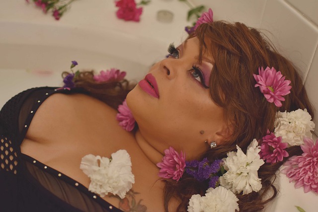 Lady lying down in flowers