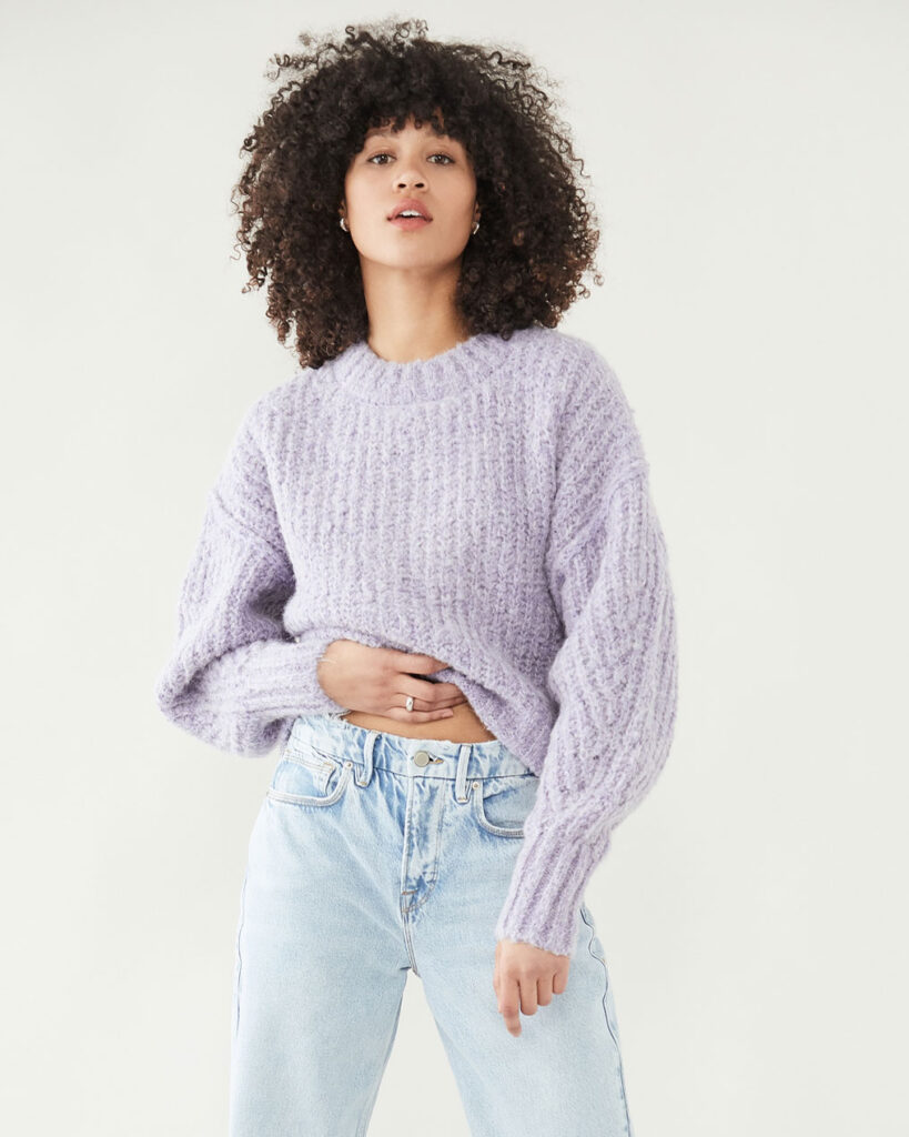 Girl wearing a purple Chunky Knit Sweaters
