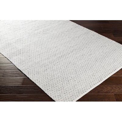 white rug for the soft hues nursery